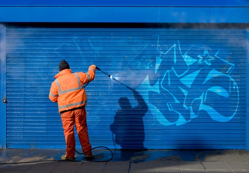 The Power Wash Store in Milwaukee has the cold water pressure washers you need to remove graffiti Cold water pressure washer being used to remove graffiti